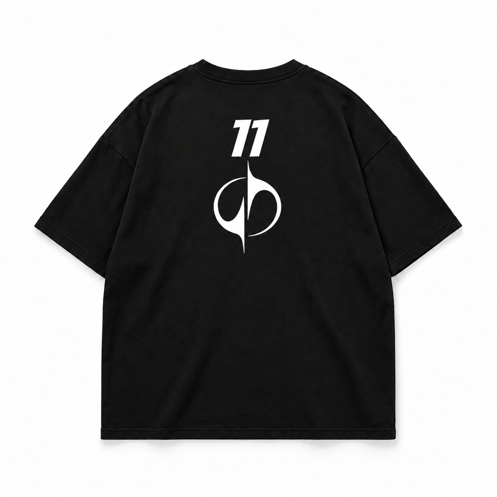 Back view: white 11 emblem on black oversized T-shirt